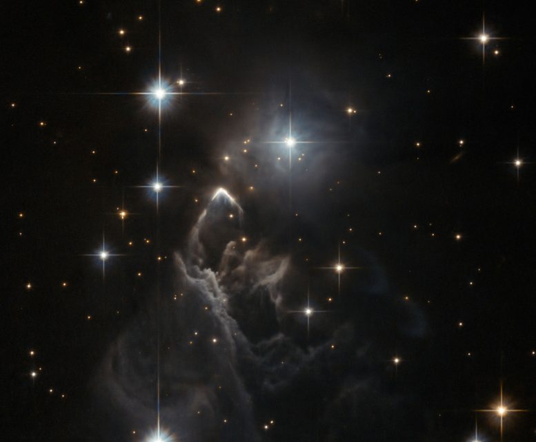 哈勃拍摄星云IRAS 05437 + 2502的引人注目的图像