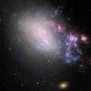 哈勃揭示了Galaxy Blazing与近距离遭遇出生的新星