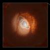 在三层塔托宁的系统中发现了一个扭曲的圆盘“撕裂的星星”